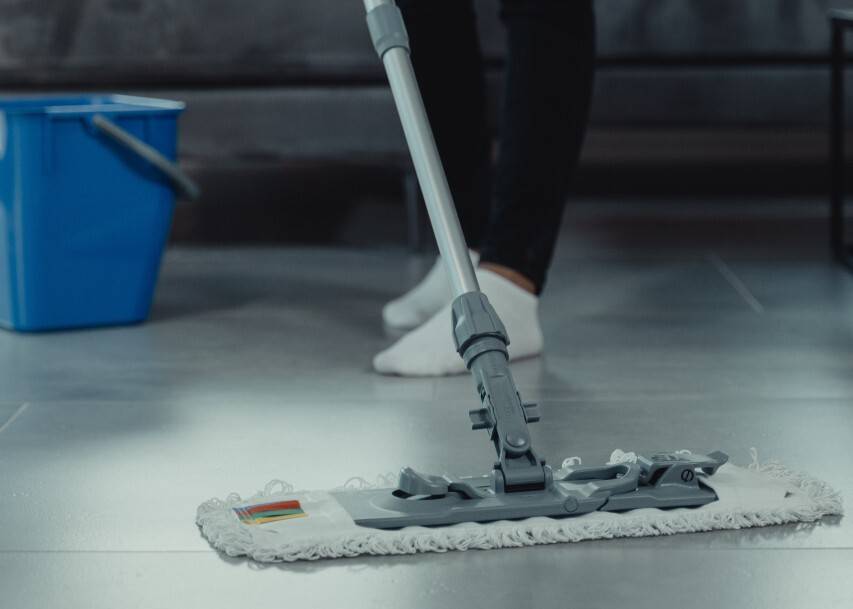 Person mopping their floor